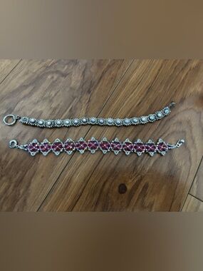 Silver Daisy Bracelet and Pink Crystal Lace Bracelet. Both included.